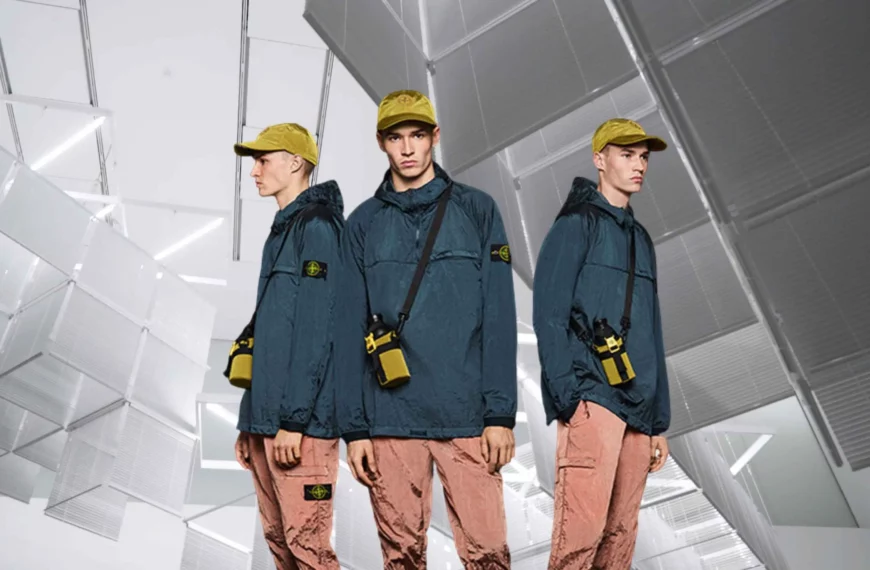 3 of the same man from different angles, wearing techwear like a yellow hat, navy technical jacket, and light pink pants