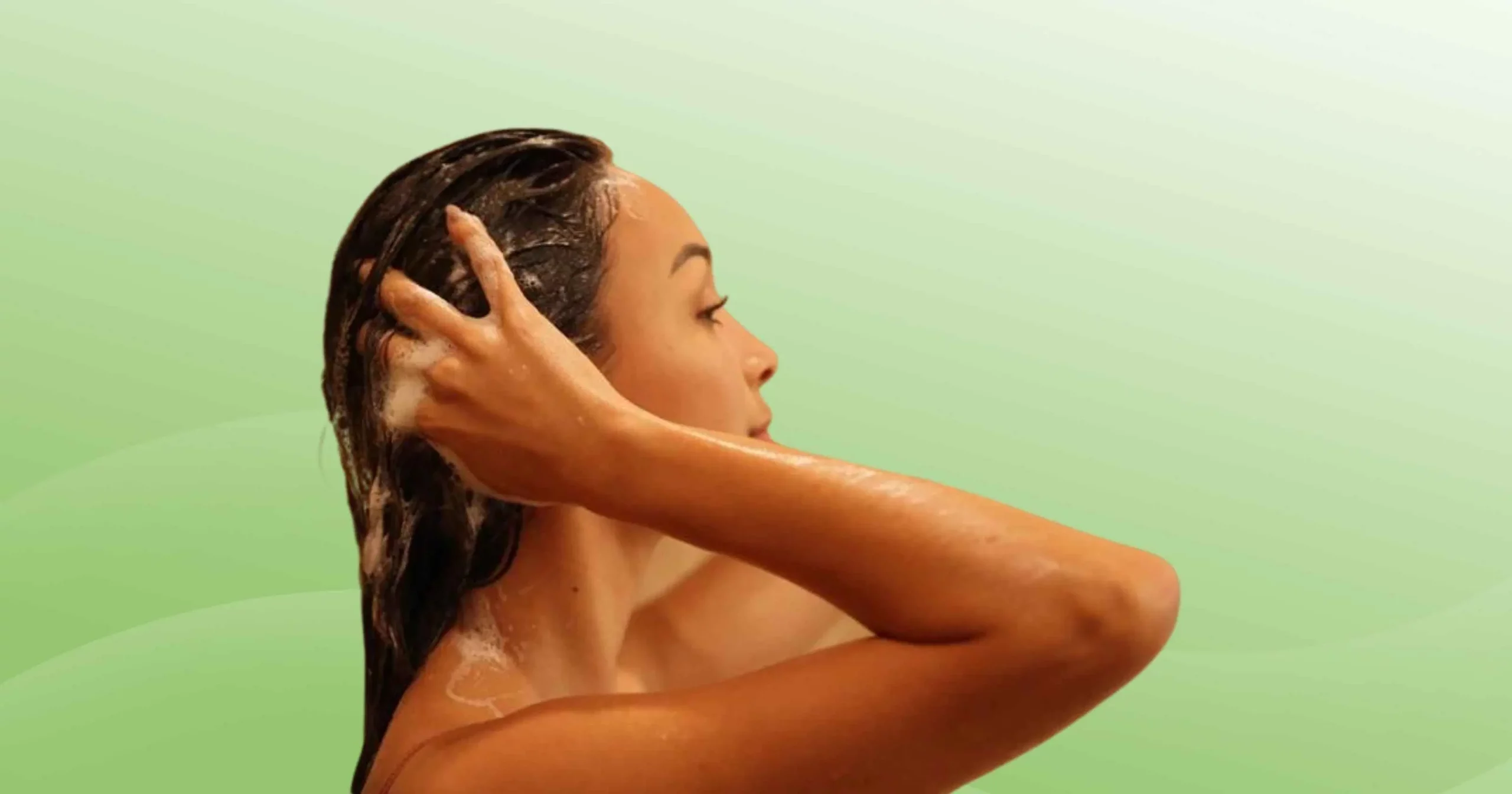 woman washing hair with Viori shampoo