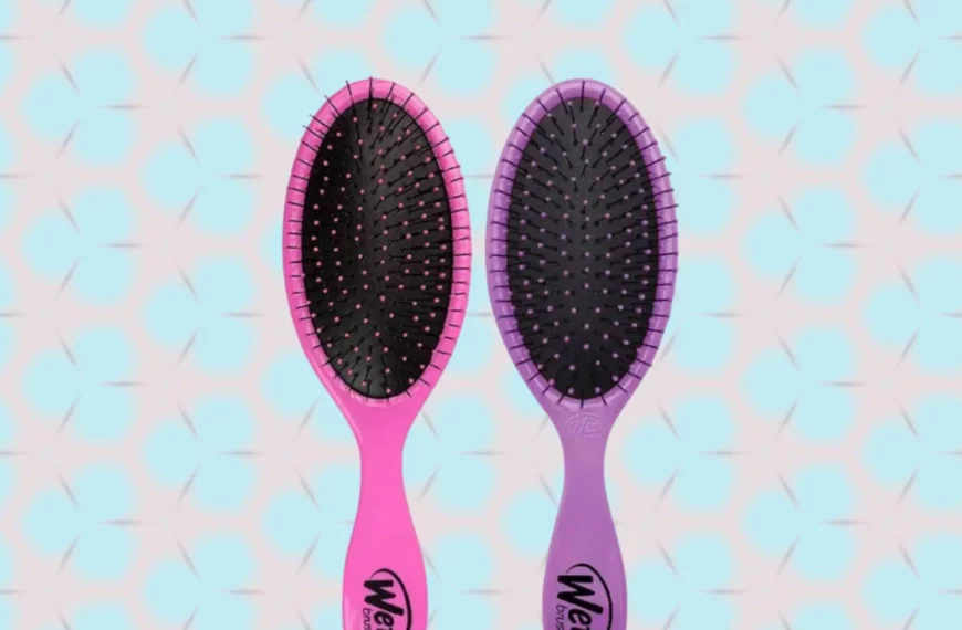 a pink wet brush and purple wet brush beside each other