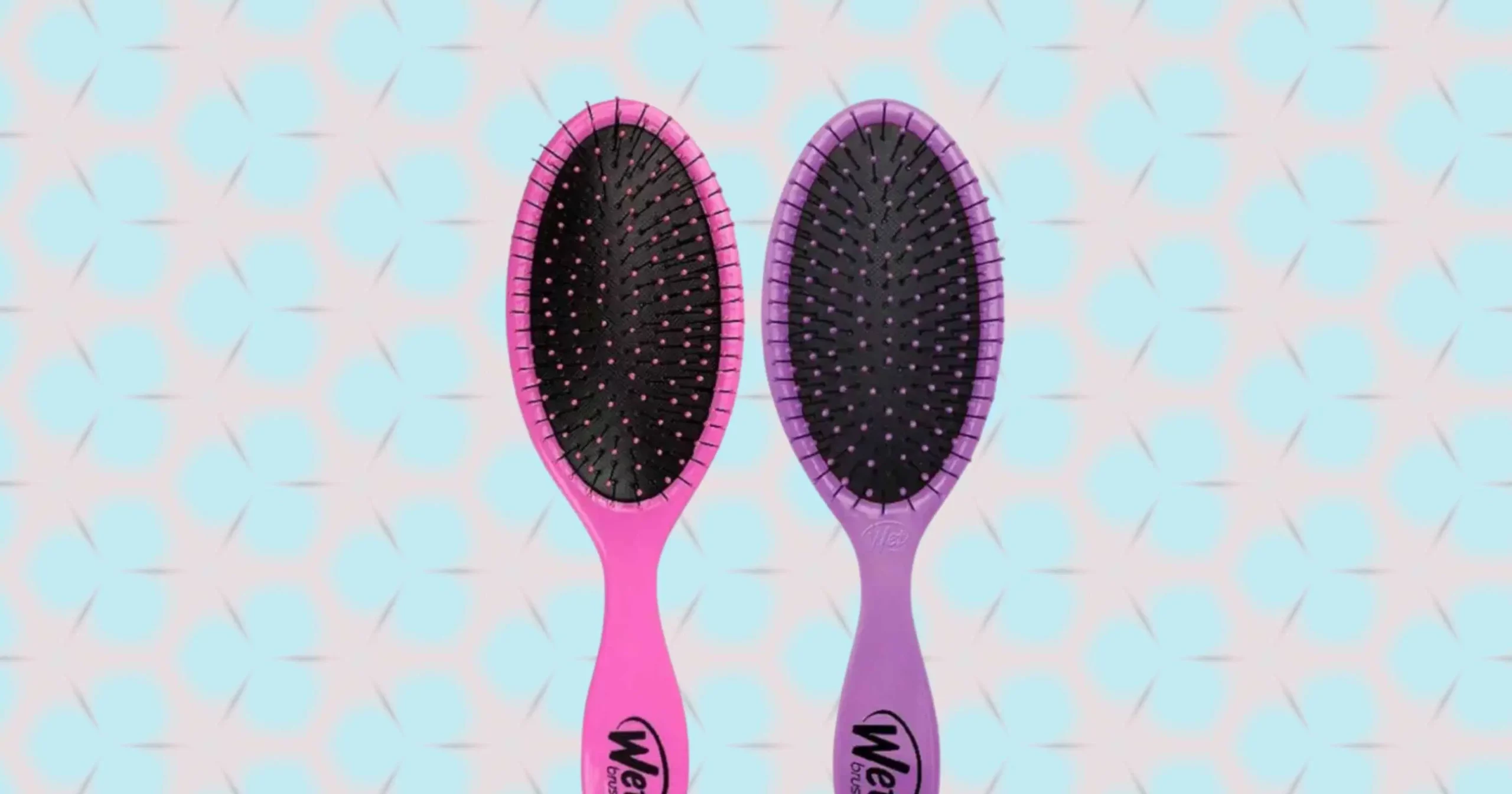 a pink wet brush and purple wet brush beside each other