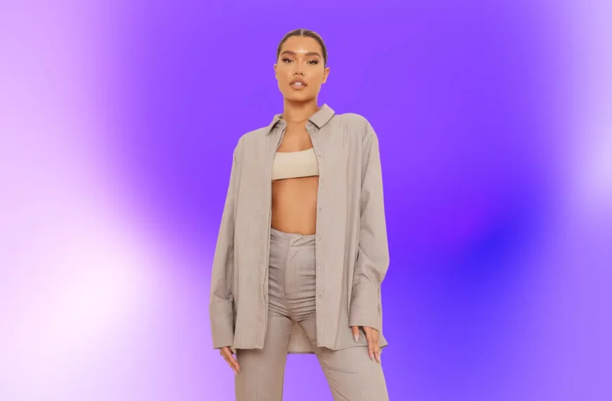 woman looking at camera, wearing beige two piece set from Pretty Little Thing; purple background