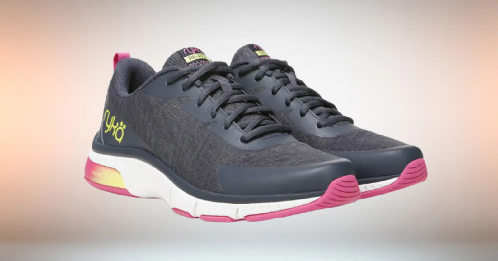 gray Ryka running shoes with white and pink outsole