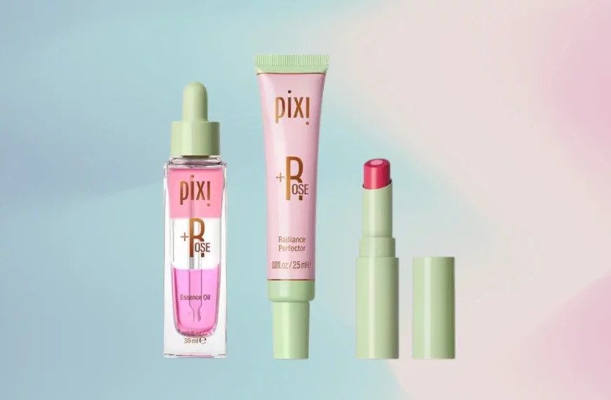 row of pink and green pixi beauty products including the essence oil, radiance protector, and lip balm