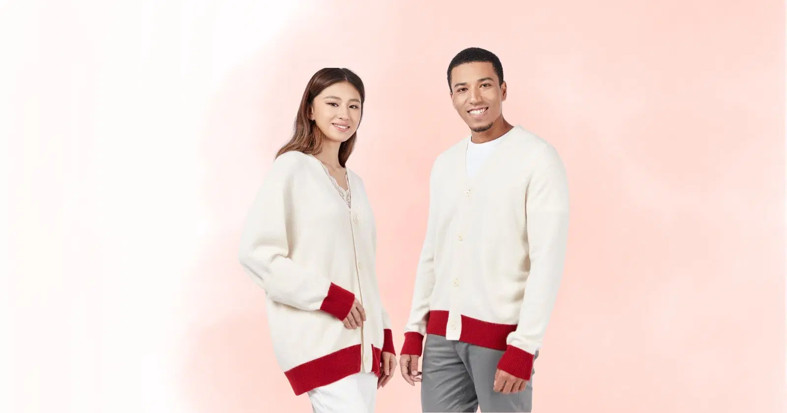 woman and man looking at camera, wearing white and red sweaters from Gobi Cashmere