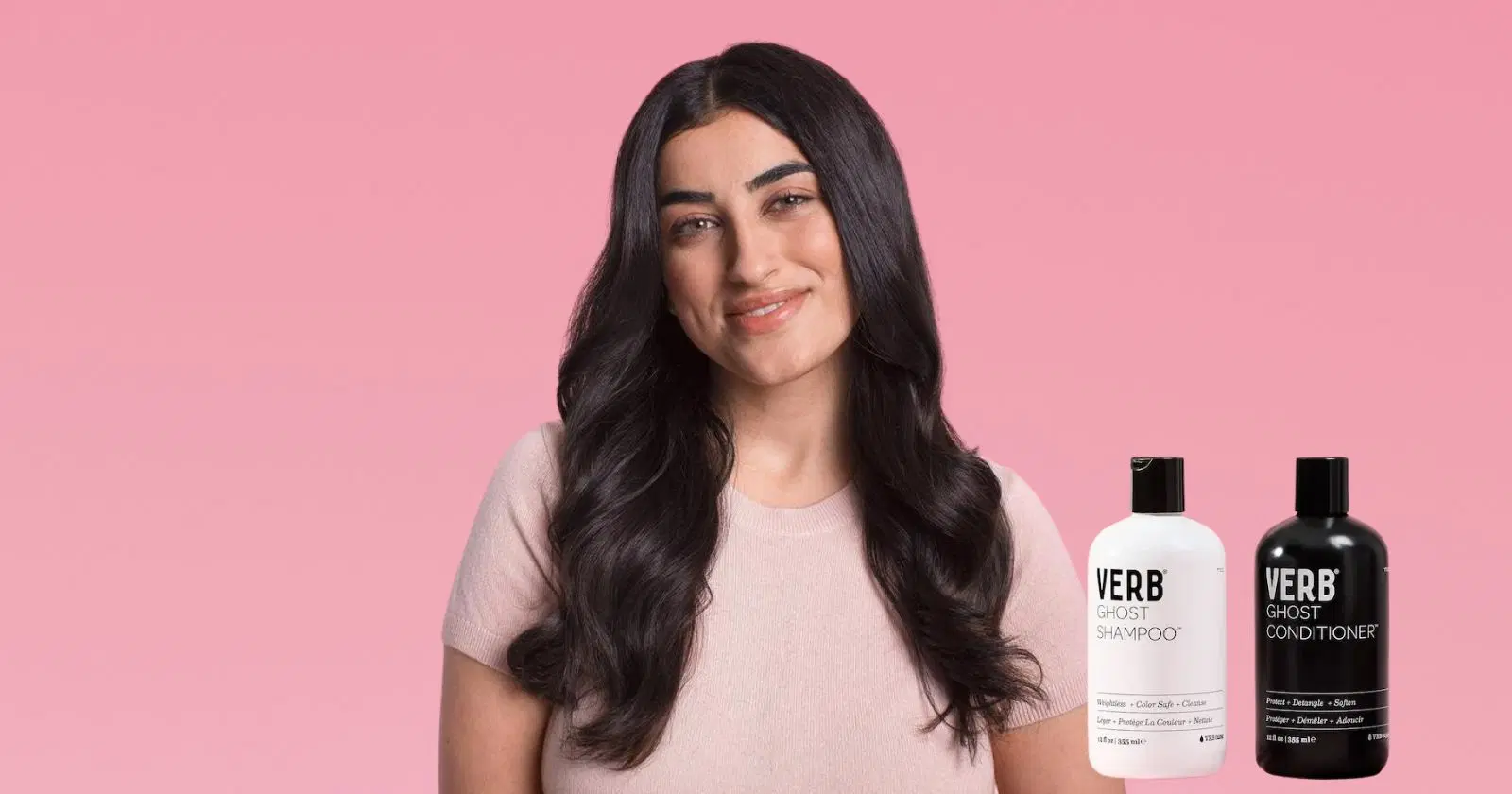 woman with long brown hair smiling at camera, bottles of Verb Ghost shampoo and conditioner in corner