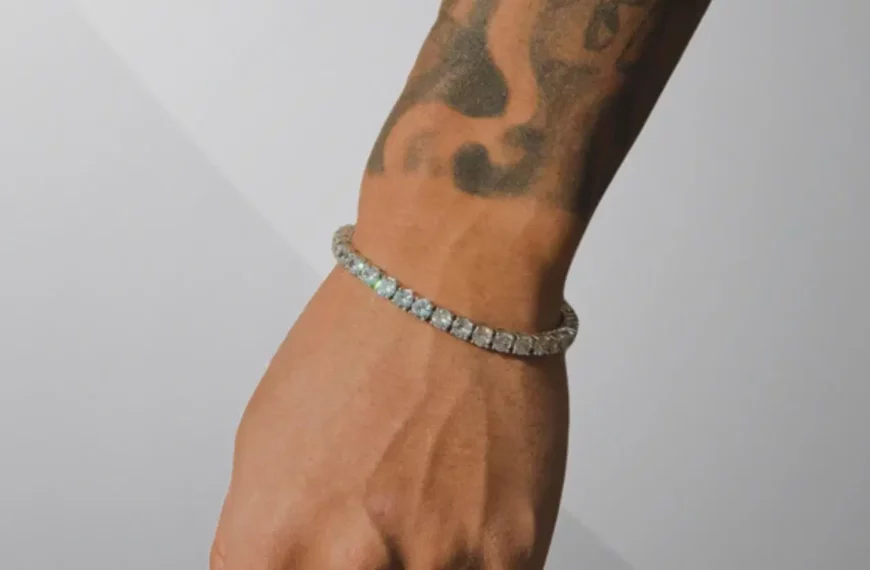 close up of person's wrist with tattoos, wearing tennis bracelet from Cernucci