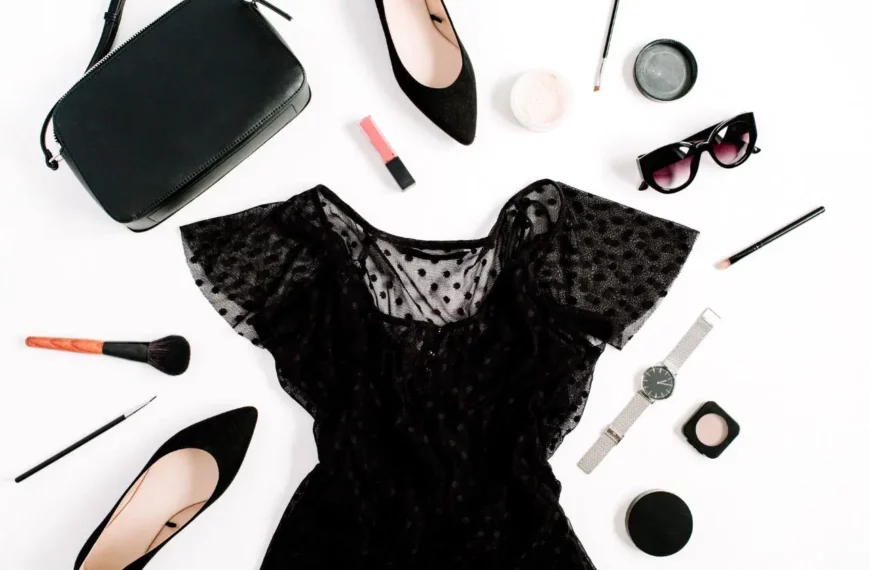 curated outfit including black dress, heels, purse, and accessories and makeup